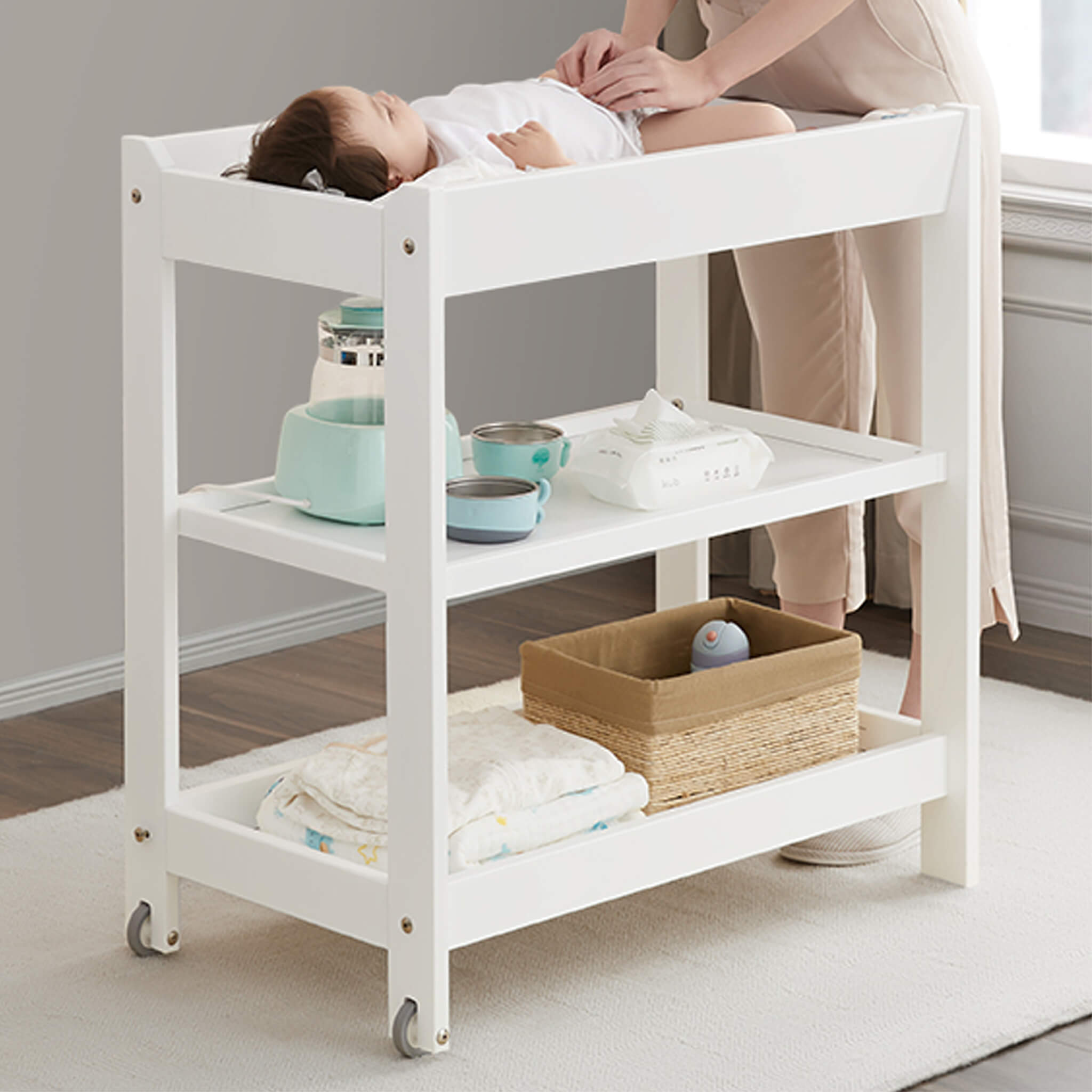 Three tier changing table in a nursery