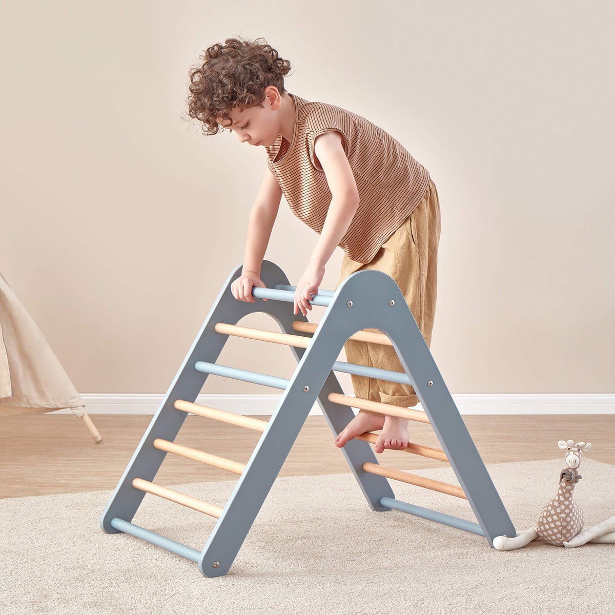 Child using the Boori Tidy Climbing Triangle