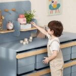 Boori Tidy Toy Cabinet with pegboard styled in a child's room