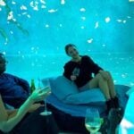 Visitors at a Frameless Lates evening event