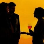 Visitors experiencing projected art during a Frameless Lates evening