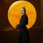 Visitors exploring a Frameless gallery installation