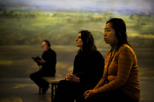 Frameless gallery space prepared for visitors