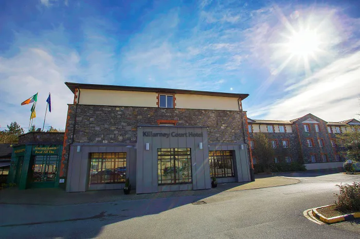 A hotel exterior illustrates the kind of property-led stay offered across the range.