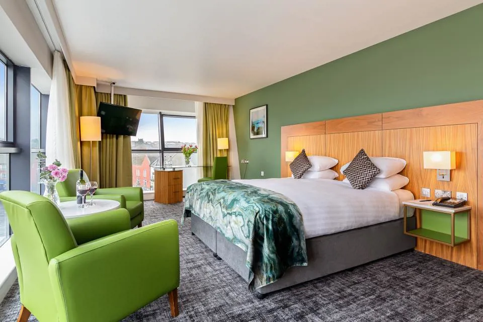Bedroom at The Glasshouse Hotel