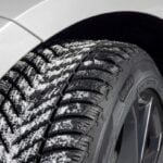 Goodyear UltraGrip Performance 3 tyre in a snowy winter close-up