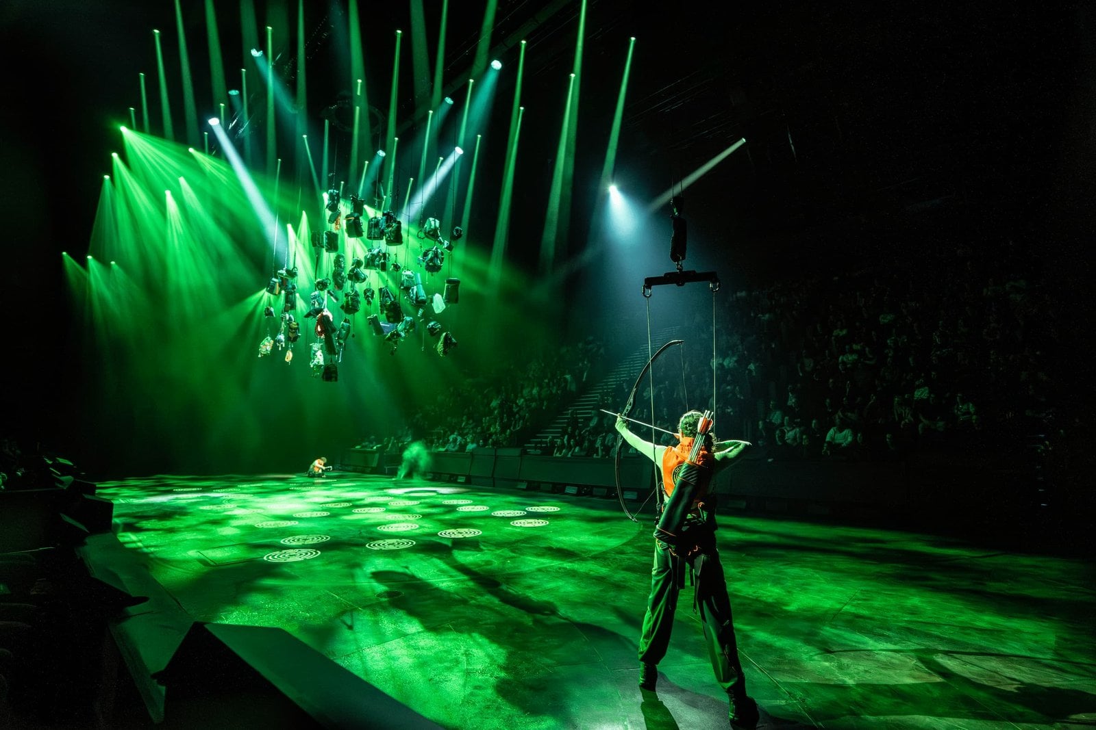 Cast members in a dramatic scene from the stage production