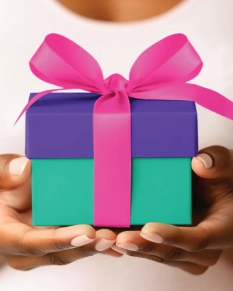 JAMNOLA gift box with a pink ribbon for gifting tickets