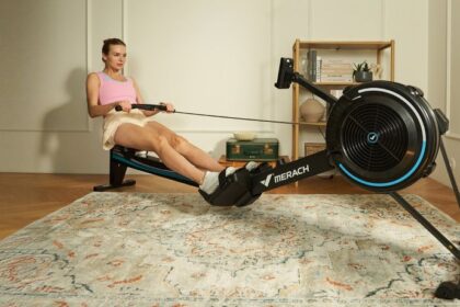 Merach R50 air resistance rowing machine in a home workout setting