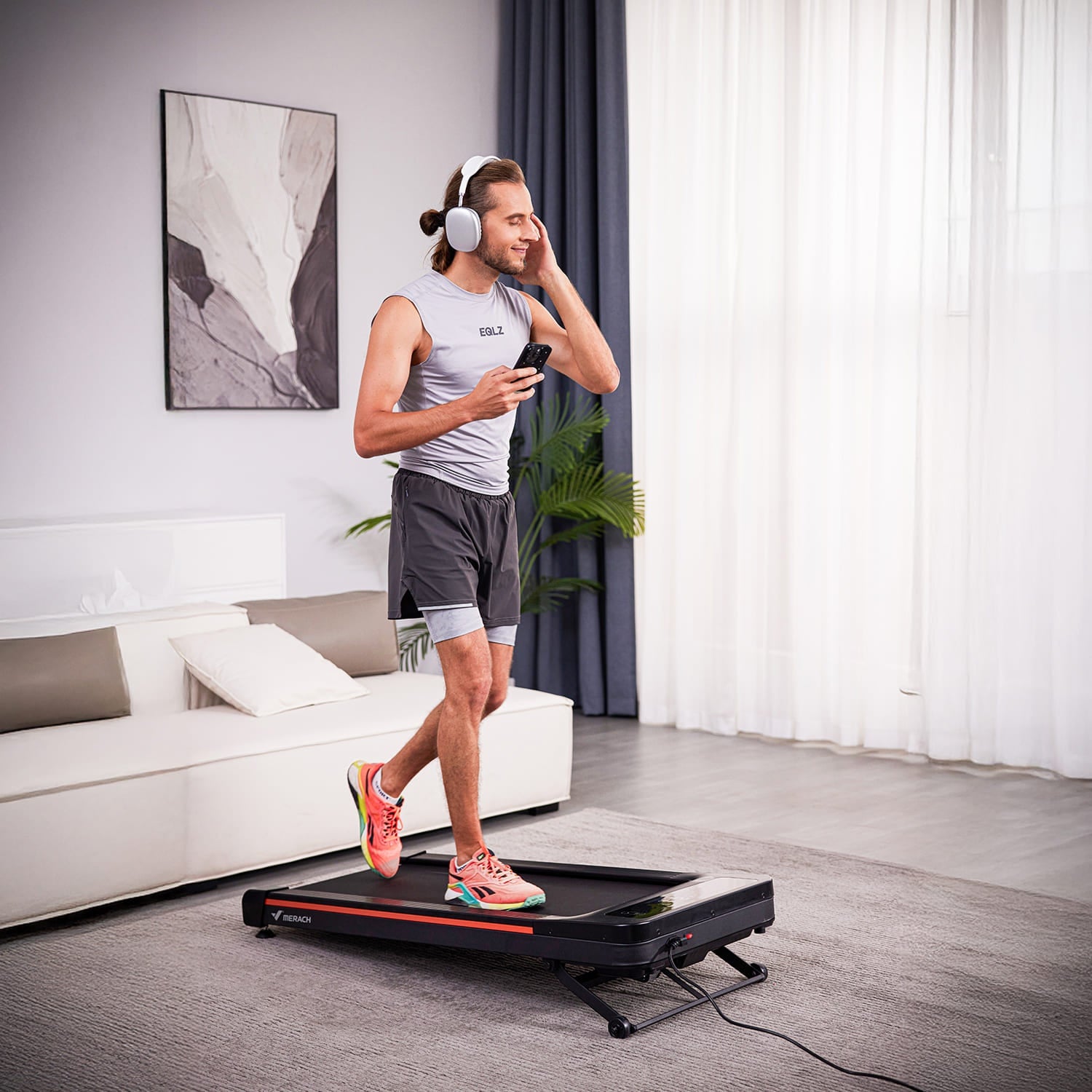 Merach T25 treadmill in a home office setting