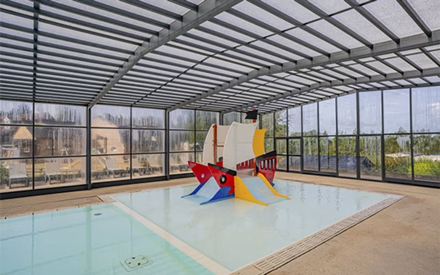 Indoor pool at Domaine de Drancourt holiday park in Normandy