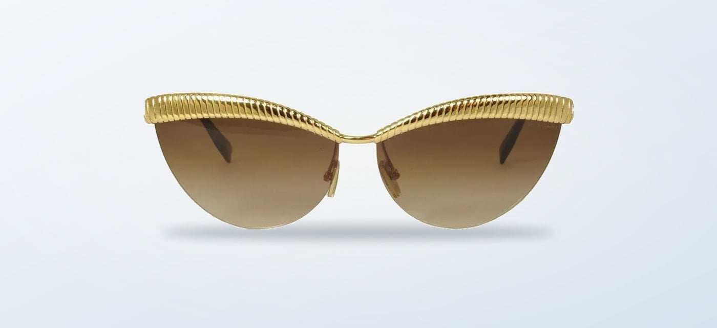 Lentes de sol Bvlgari TUBOGAS dorados en fotografía de producto