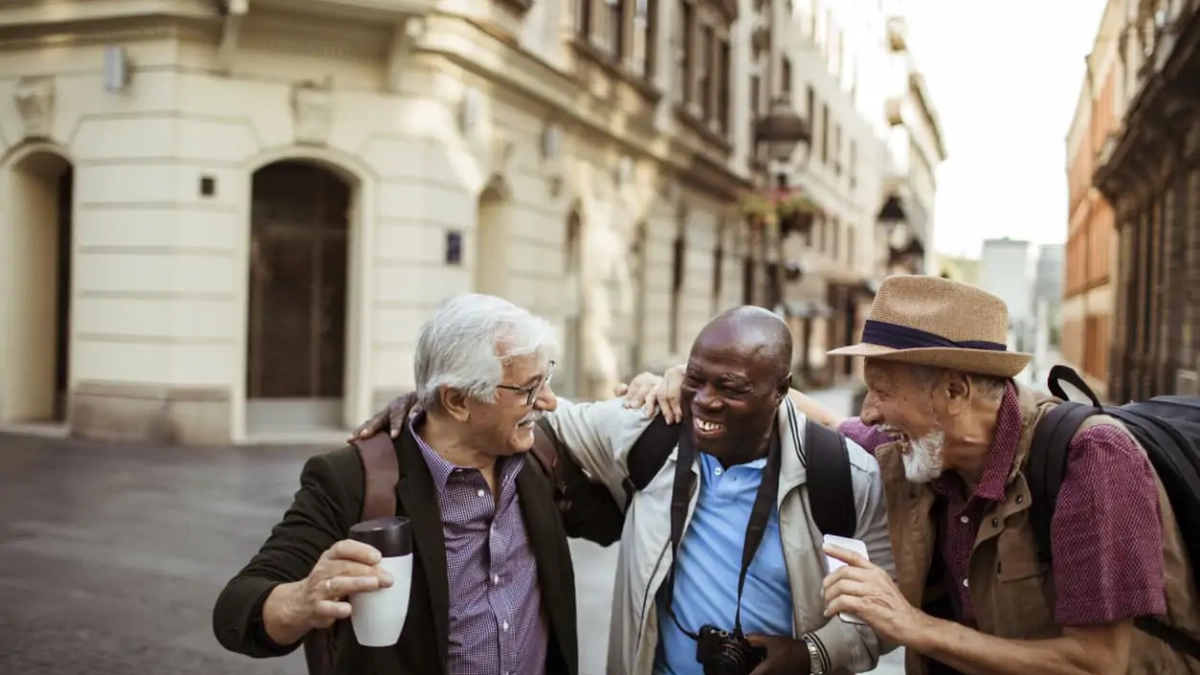 Group of travellers laughing together
