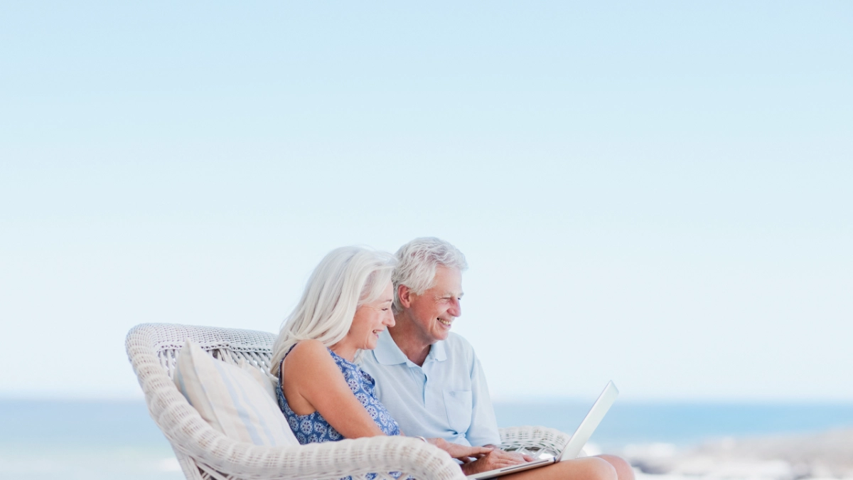 Older couple checking holiday details together