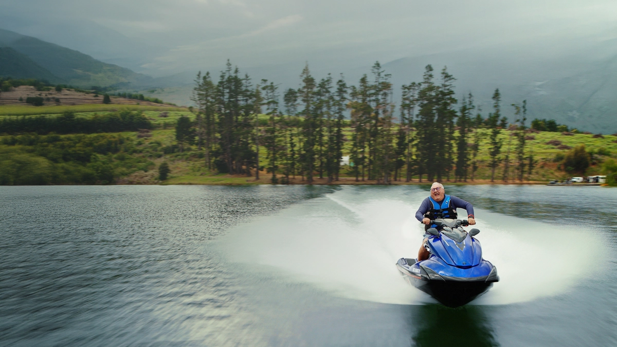 Person riding a jetski on holiday