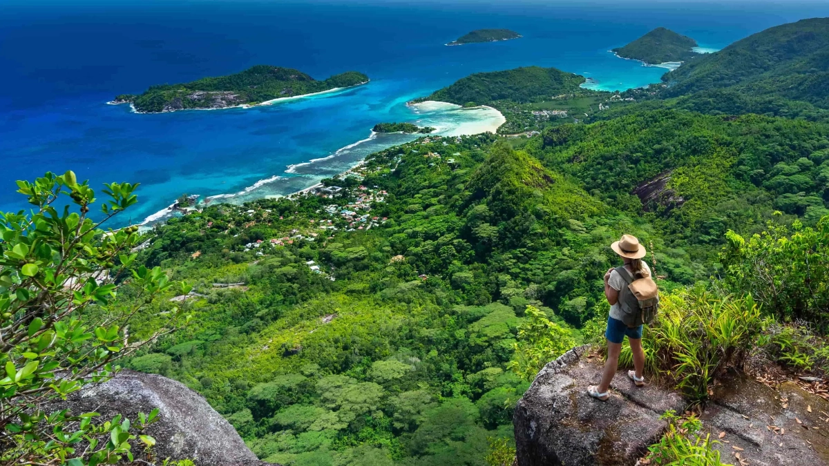Tropical island coast with a mountain in the distance