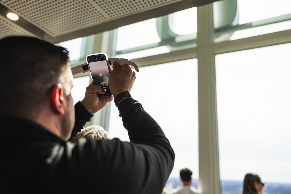 Visitors enjoying a high view over Boston at View Boston